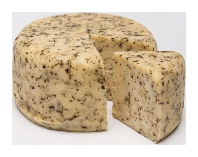 Queso Manchego Hierbas Finas, marca Los Cuates